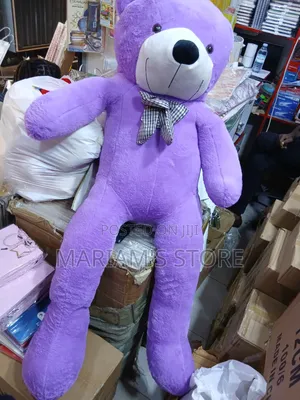Human-Sized Purple Plush Teddy Bear With a Plaid Bow Tie.