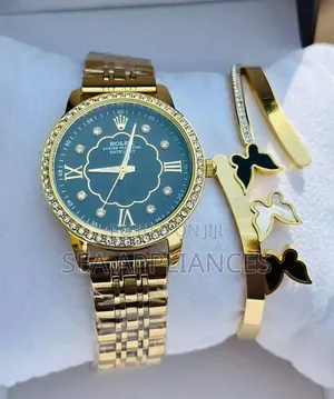 Rolex Gold and Black La