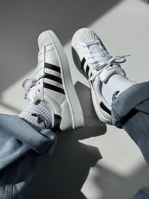 Reign Champ Suede Superstar Sneakers – Classic Collaborative Style