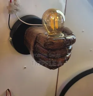 Hand Holding Lamp Holder