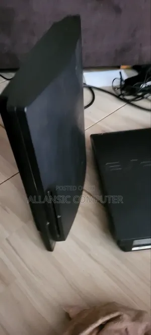 PS3 Slim With 2 Controllers