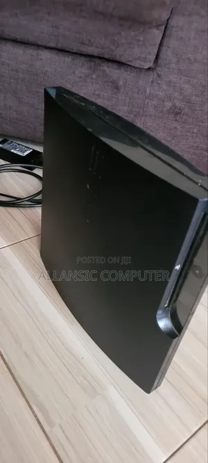 PS3 Slim With 2 Controllers