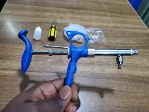 Poultry Vaccinator Gun With Tubing and Accessories
