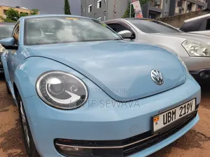 Volkswagen Beetle 1.8T PZEV 2dr Hatchback (1.8L 4cyl Turbo 5M) 2015
