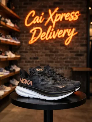 HOKA Clifton 9 Running Shoes in the Black / Rose Gold