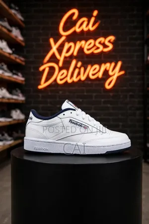 Reebok Club C 85 in the White/Navy Sneakers