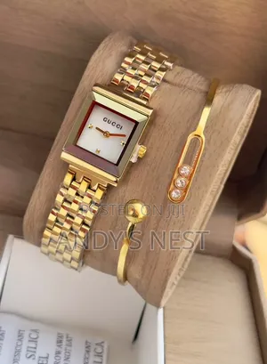 Golden Gucci Watch With a Bangle