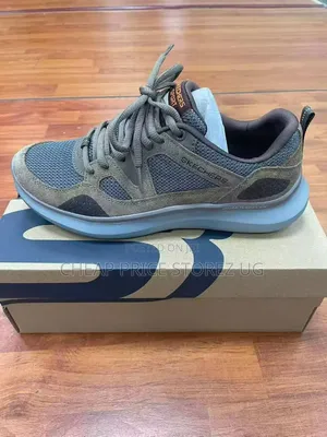 A Pair of Black and Grey Trail Hiking Shoe Bright Orange Lace