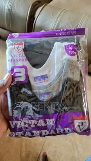 White, Black and Grey 3 PC Kids Vests 3-14yrs