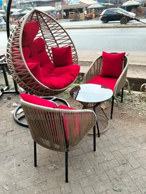 A Pair of Rattan Chairs, Egg Swing Chair and Table From 2,500,000/-