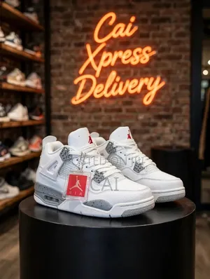 Air Jordan 4 Retro "White Oreo" Sneakers.