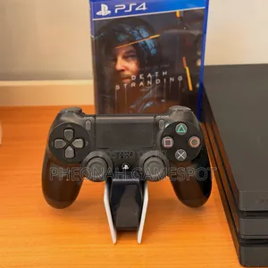 Check Out This PS4 Pro With 32 Heavy Games and 2 Controllers