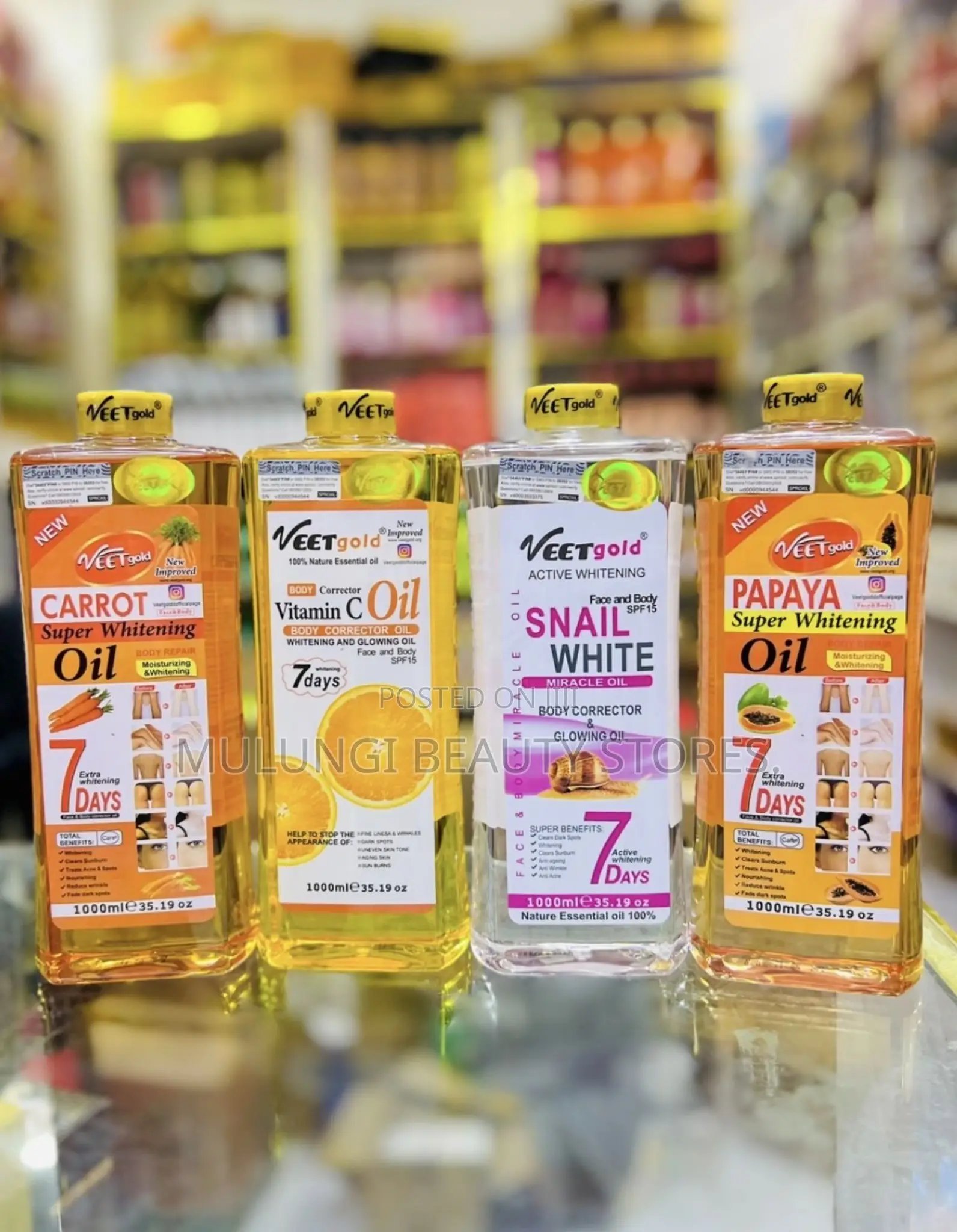 1000ml Bottles of Veet Gold Face and Body Oils