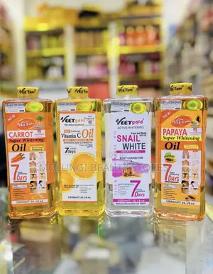 1000ml Bottles of Veet Gold Face and Body Oils
