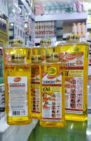 1000ml Bottles of Veet Gold Face and Body Oils