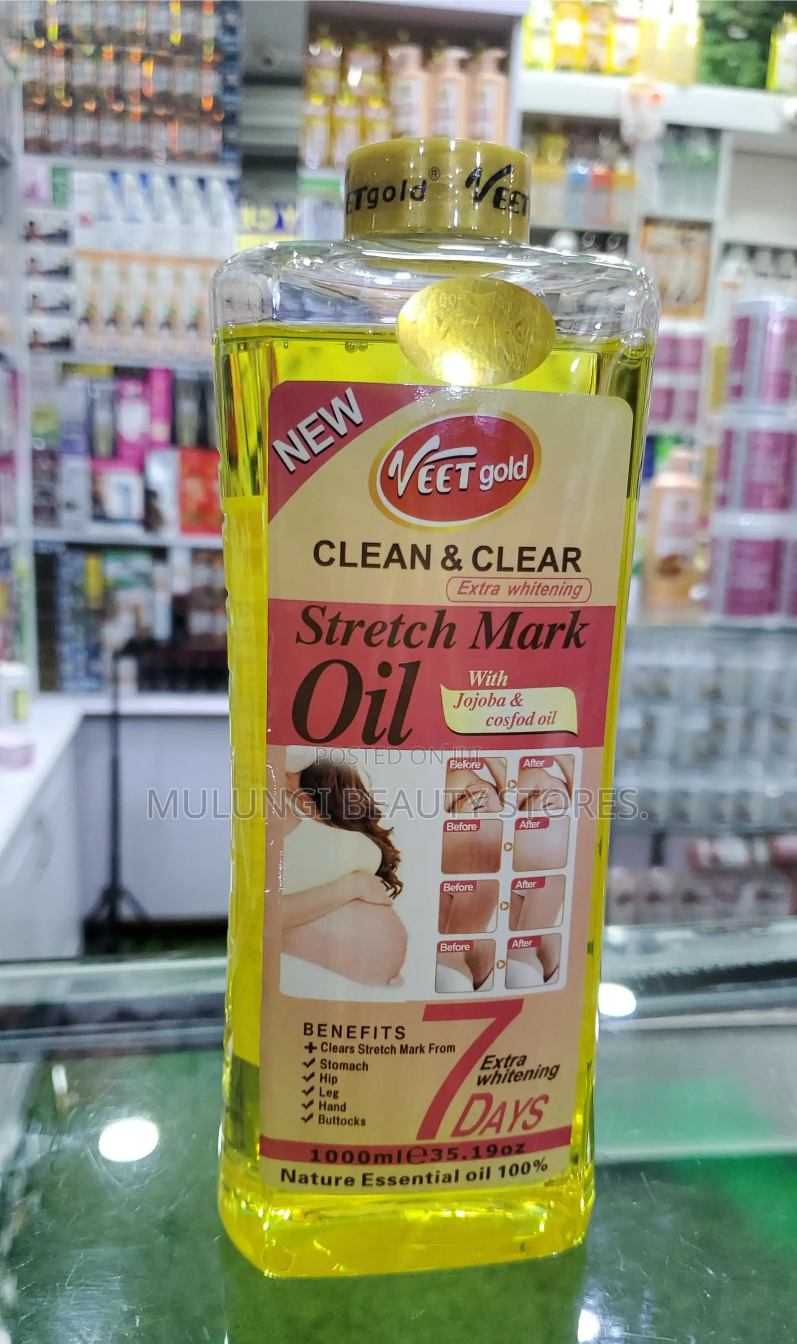 1000ml Bottles of Veet Gold Face and Body Oils