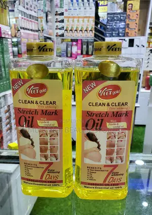1000ml Bottles of Veet Gold Face and Body Oils