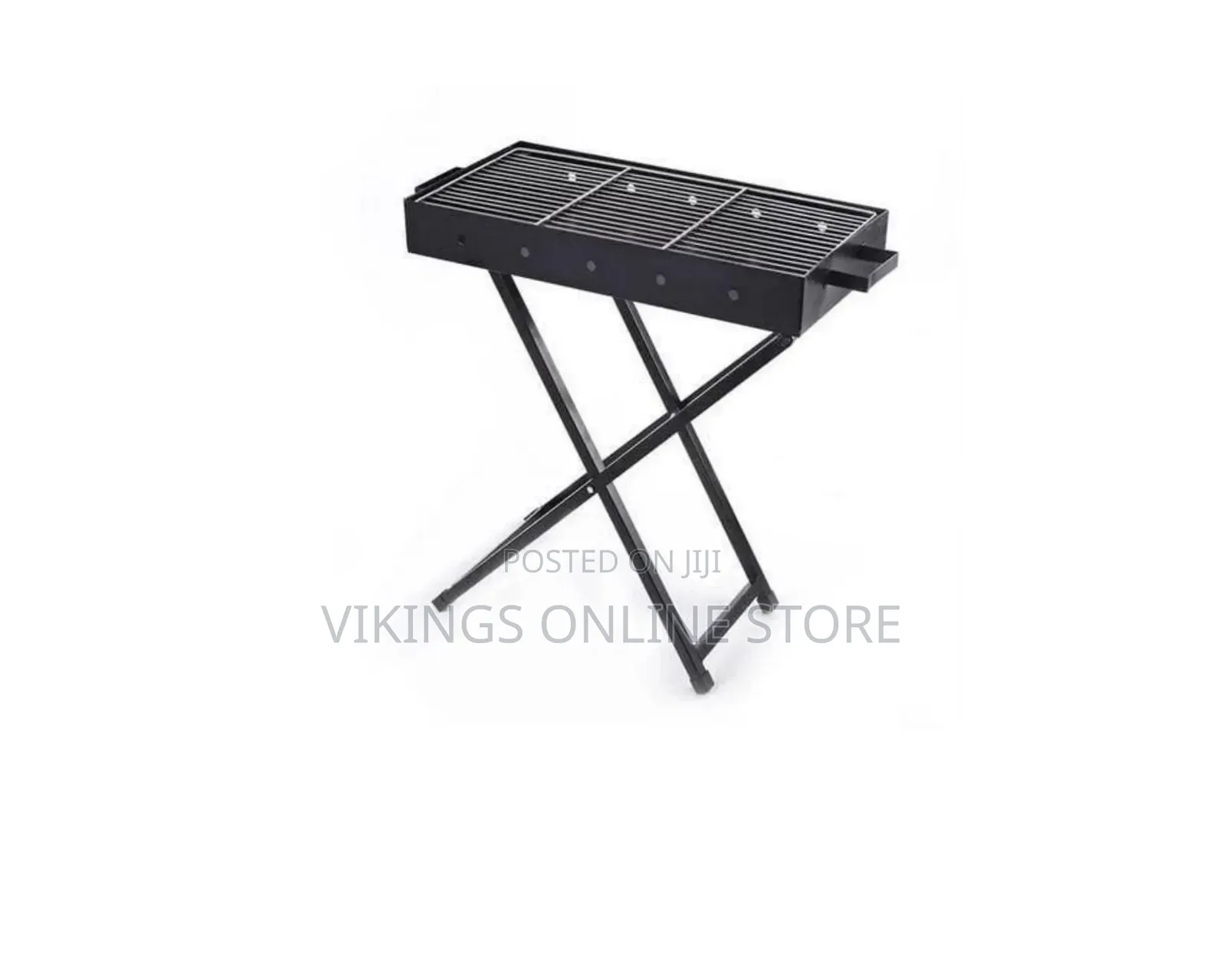 A Portable Folding Charcoal BBQ Grill With a Black Rectangular