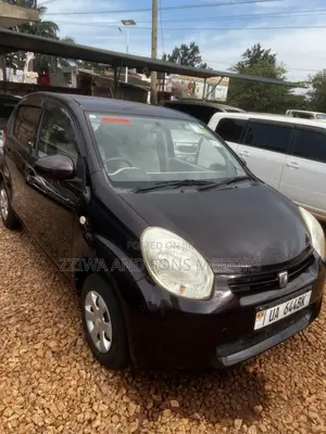 Toyota Passo 1.3 FWD 2011 Maroon
