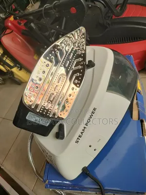 Russell Hobbs 2400W Steam Power Generator Iron (Model 24420-56).