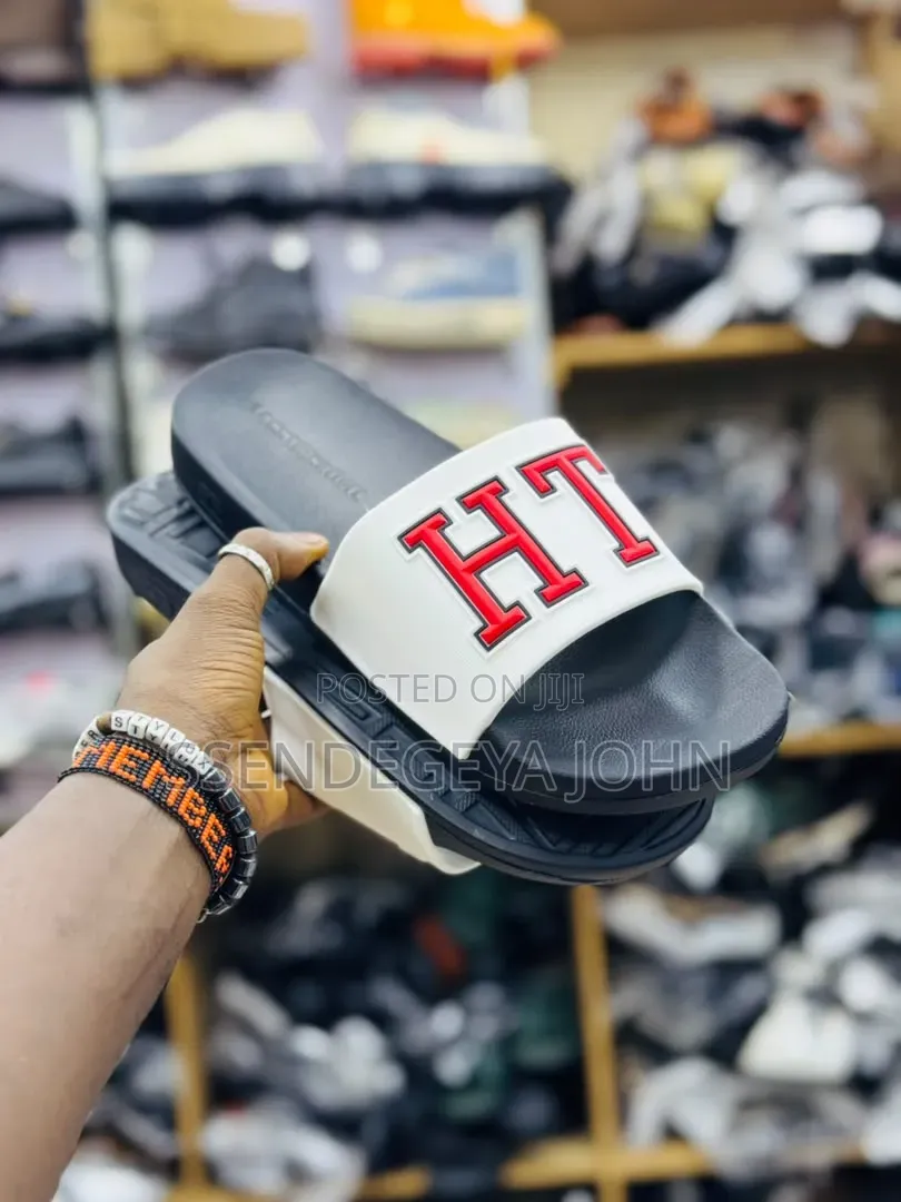 Tommy Hilfiger Monotype Pool Slides.
