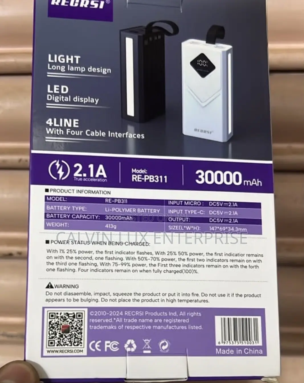 Recrsi 30,000mAh Power Bank RE-PB311 - 4 USB Ports + Fast Charge 2.1A