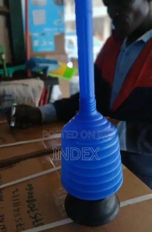 Toilet Plunger With a Rubber Suction Cup Base.