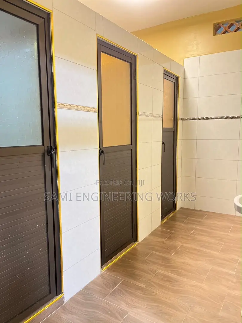 Bronze Colour Aluminium Bathroom Door – Stylish & Durable