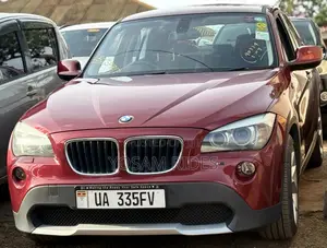 BMW X1 sDrive28i 4dr SUV (2.0L 4cyl Turbo 8A) 2014 Red