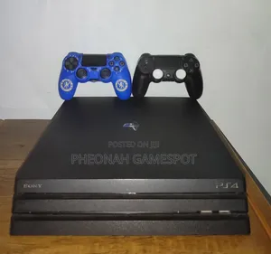 Almost New Sony PlayStation 4 Pro. Chipped With Over 32 Games & 2 Pads