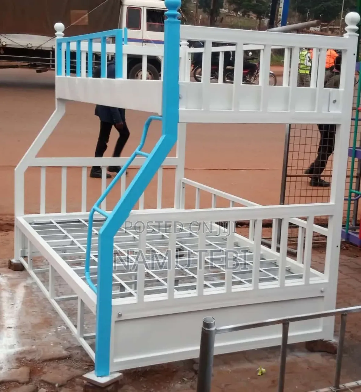 Metal Double Decker Bunk Bed Frame With a Side Ladder.