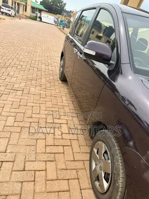 Toyota Sienta 1.5 AWD 2012 Maroon