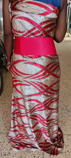 Red and Beige Gomesi Fabric