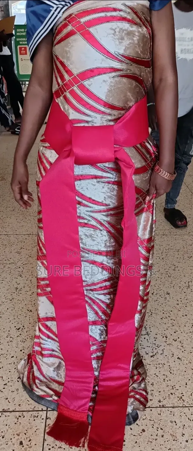 Red and Beige Gomesi Fabric