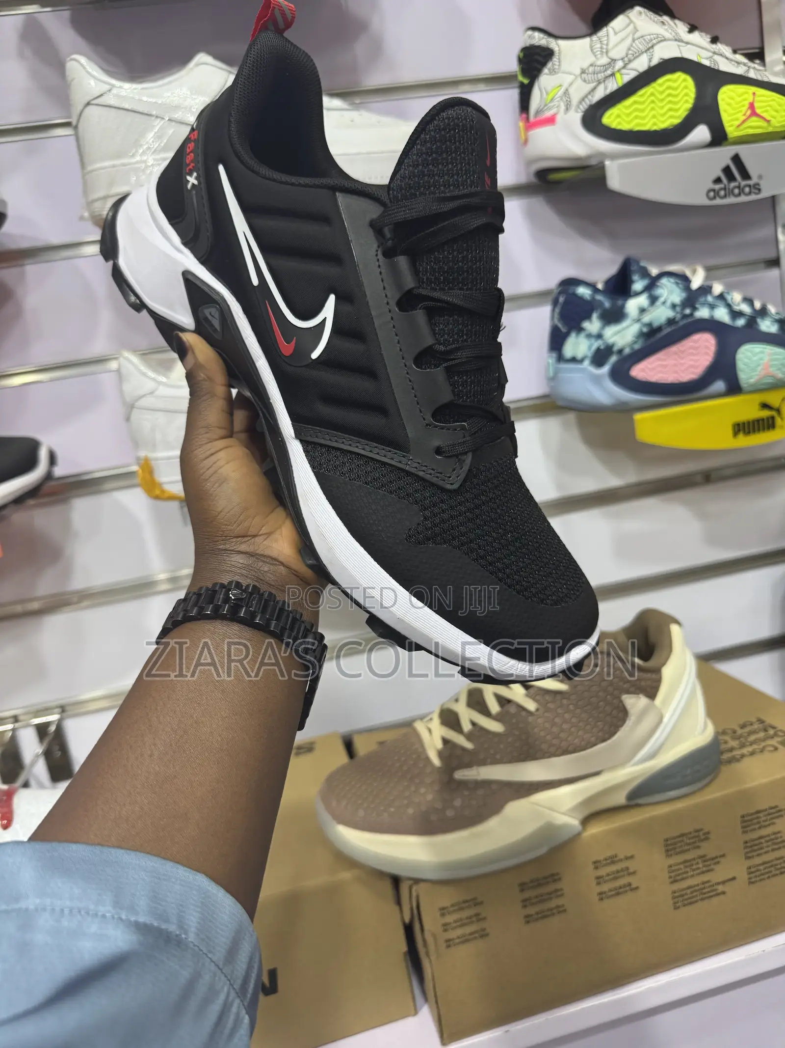 Black and White Nike Fast X Sneakers