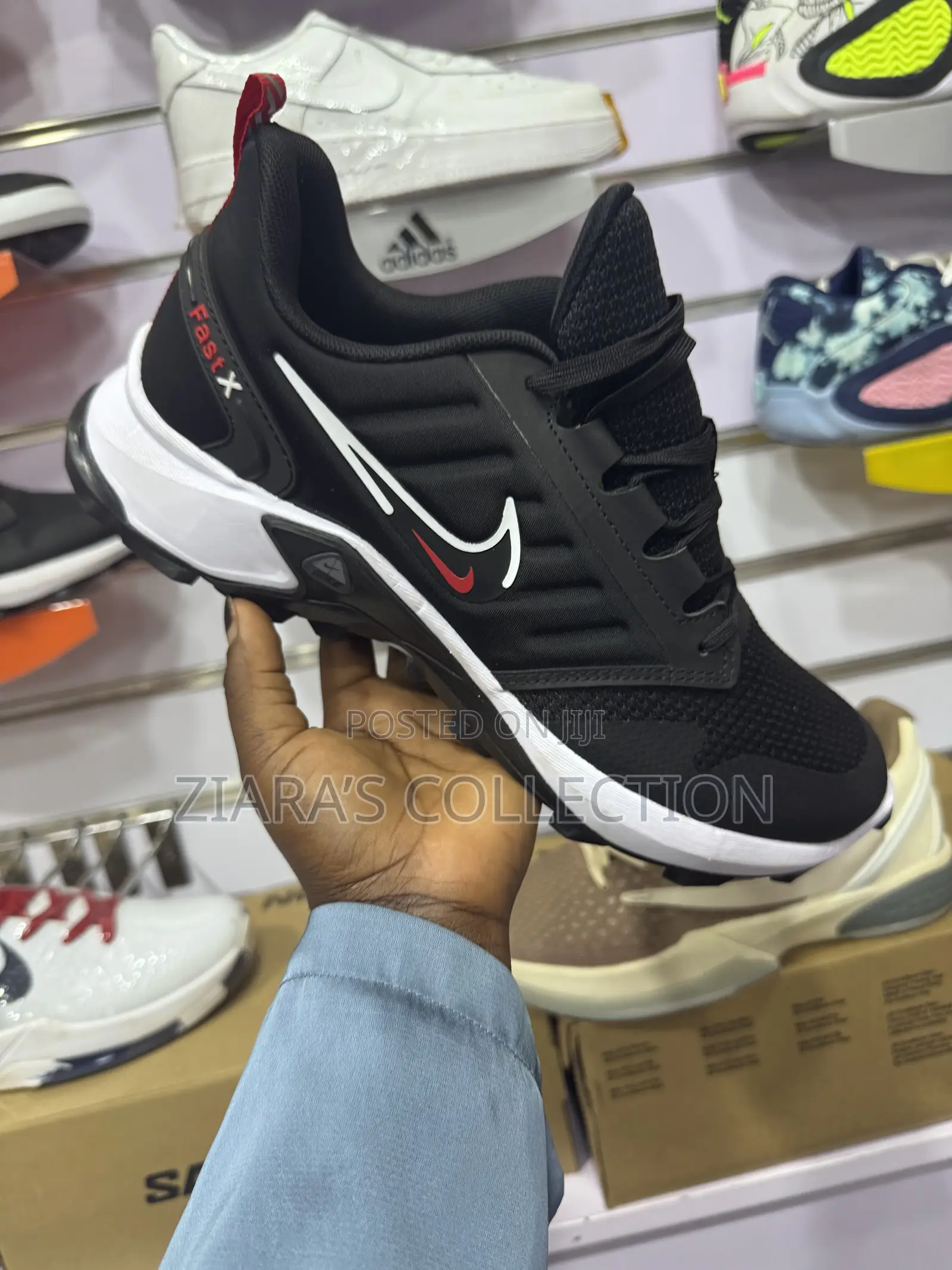 Black and White Nike Fast X Sneakers