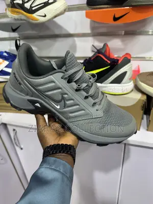 Gray Nike Fast X Sneakers
