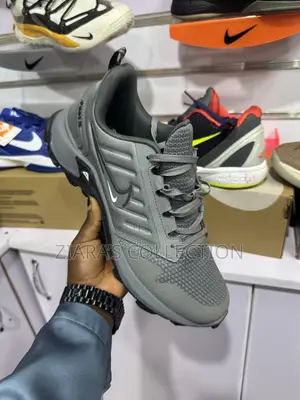 Gray Nike Fast X Sneakers