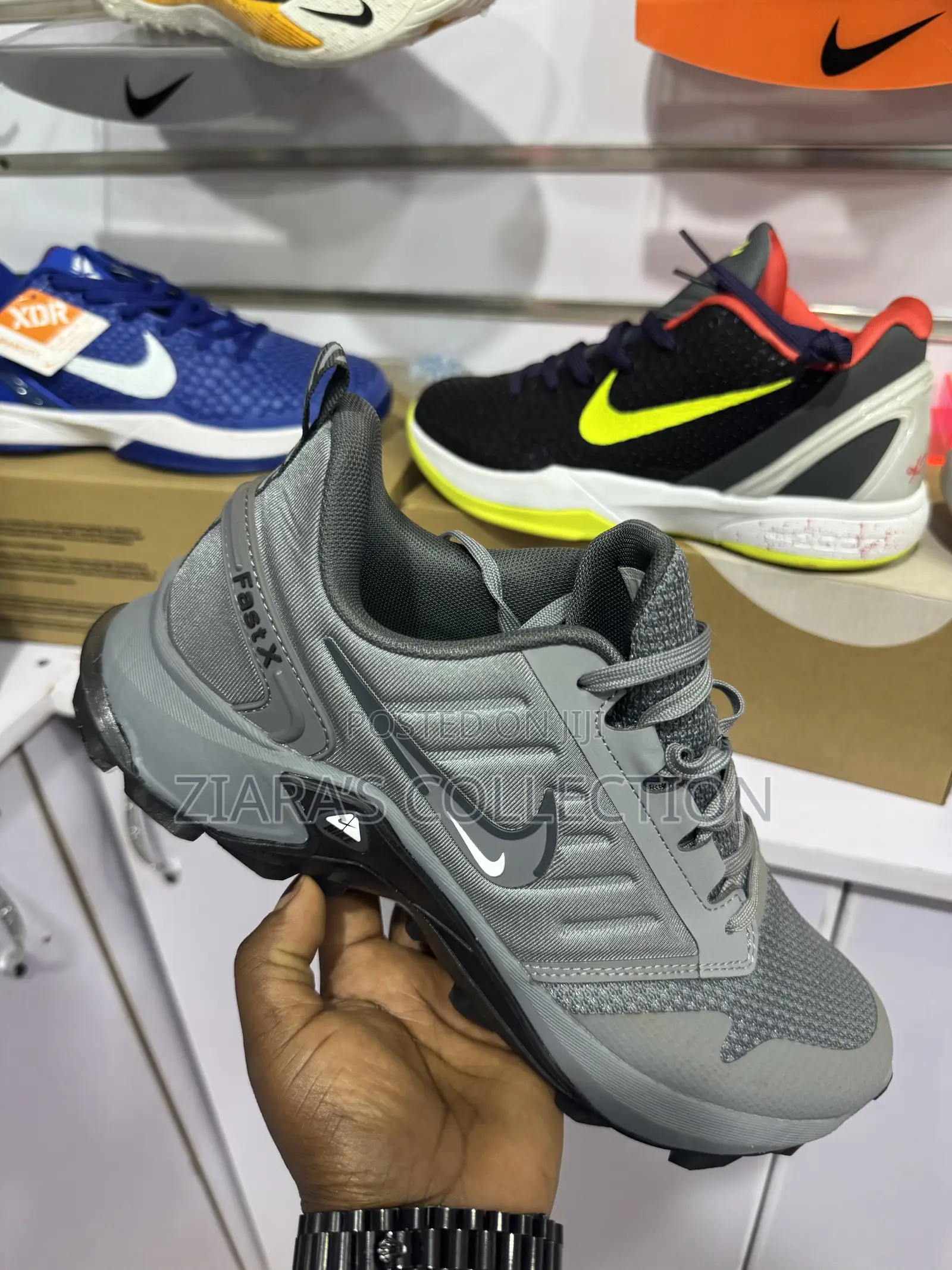 Gray Nike Fast X Sneakers