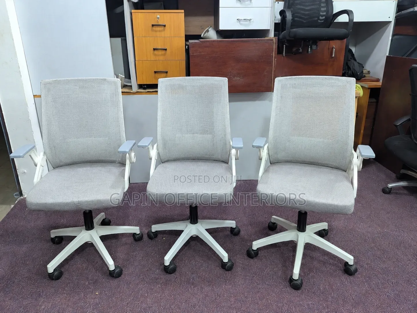 Off -White Adjustable Office Chairs With Movable Armrests.