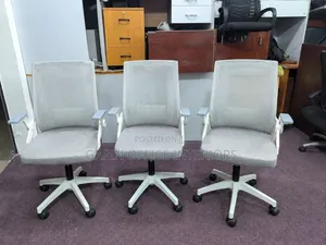 Off -White Adjustable Office Chairs With Movable Armrests.