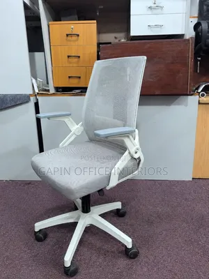 Off -White Adjustable Office Chairs With Movable Armrests.