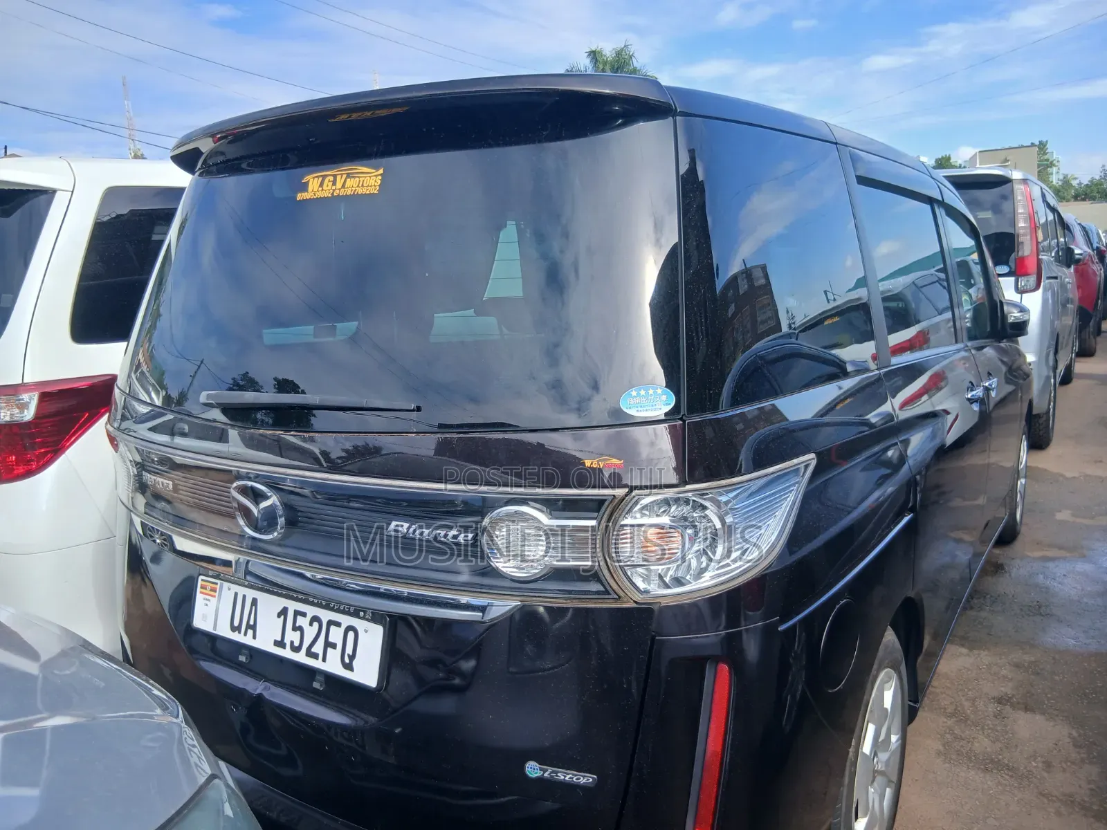 Mazda Biante 2014 Maroon