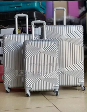 Silver Patterned Suit Cases