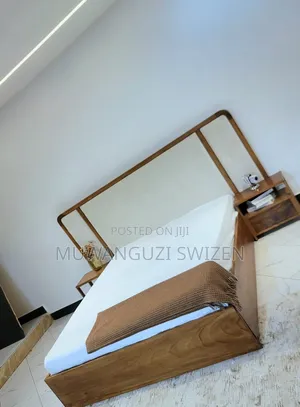 5 by 6 Tufted Extended Headboard With Wooden Pannels and Side Drawers