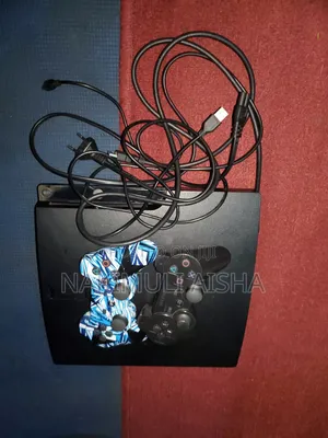 PlayStation 3 Slim Still in Good Condition 2 Original Controllers