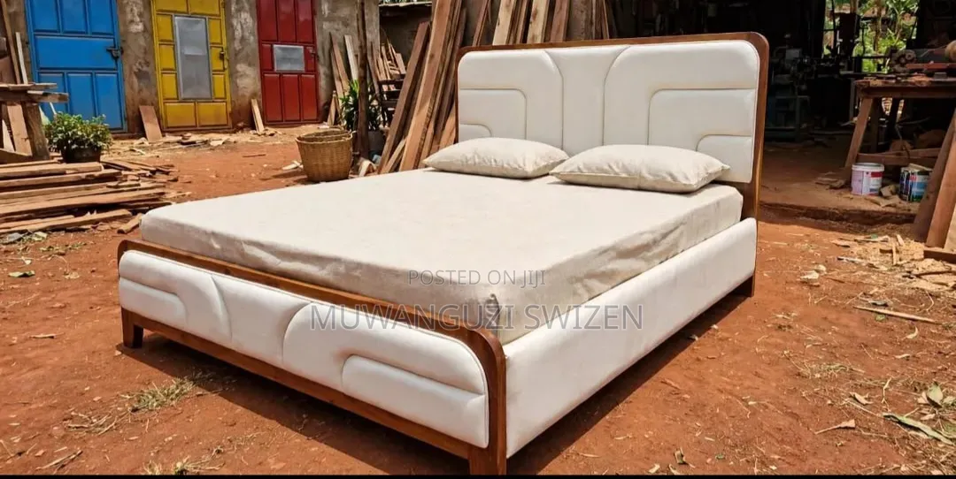 It's a Six by Six (6×6) Wooden and Fabric Bed