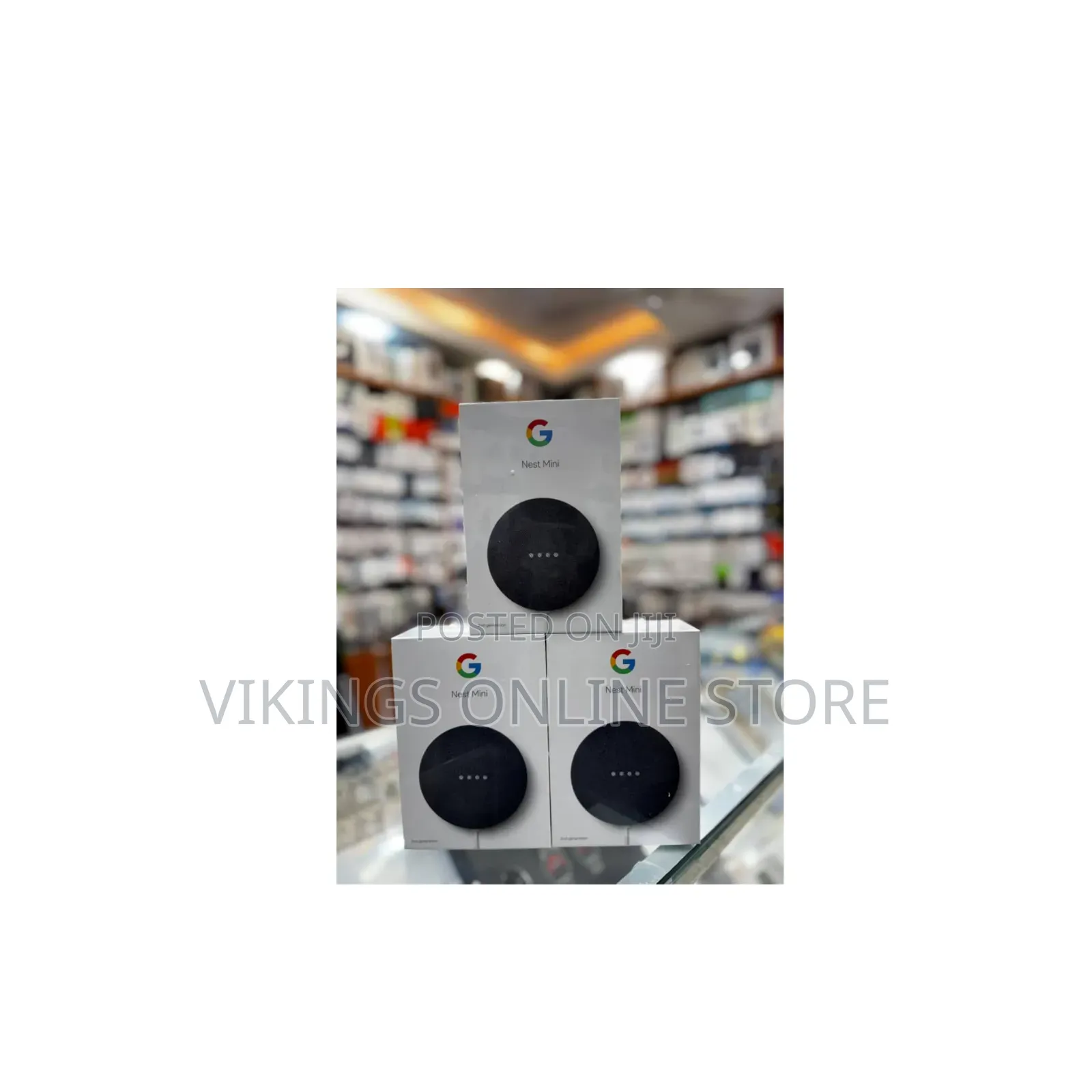 Mini (2nd Generation) Smart Speaker in a Dark Grey/Charcoal Color.
