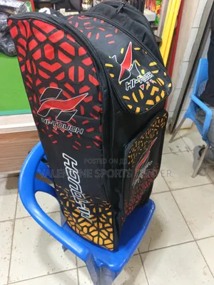 A Black, Red, Orange, Hi Touch Stand-Up Spots Dufle /Kit Bag