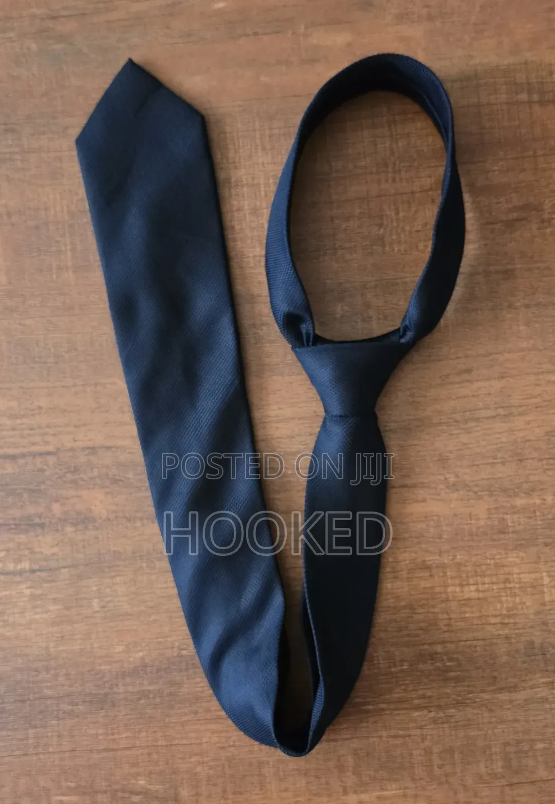 A Black Necktie Will Carry Your Look at Any Given Event.
